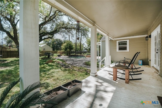 view of patio featuring french doors and a fenced backyard