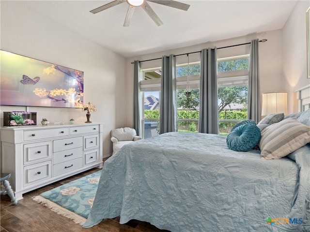 2136 Pioneer Pass, Seguin, TX 78155 - bedroom with wood finished floors and a ceiling fan
