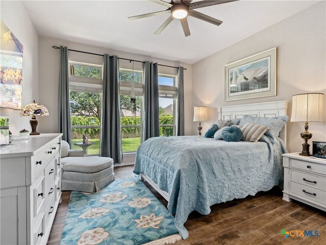 2136 Pioneer Pass, Seguin, TX 78155 - bedroom featuring dark wood finished floors and a ceiling fan
