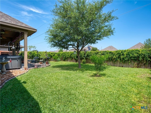 2136 Pioneer Pass, Seguin, TX 78155 - view of yard featuring a hot tub, a patio area, and ceiling fan