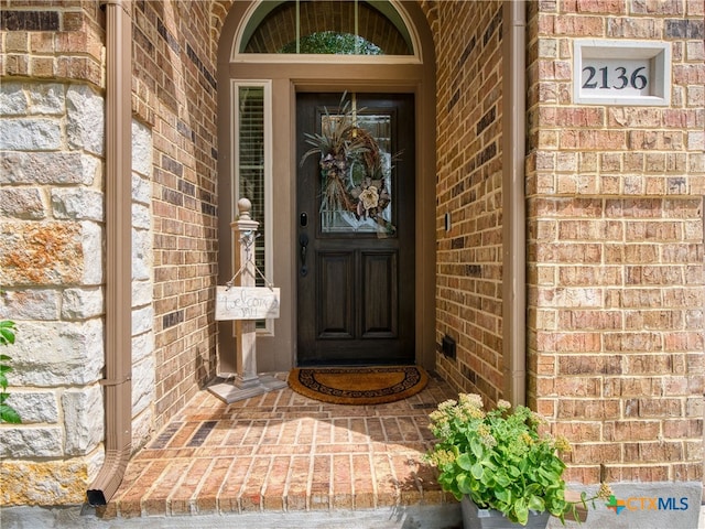 2136 Pioneer Pass, Seguin, TX 78155 - view of exterior entry with brick siding