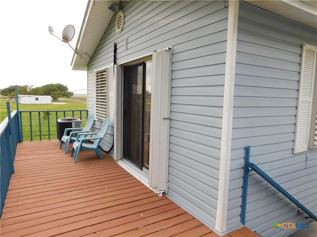 135 W Bayshore Dr, Palacios, TX 77465 - deck featuring central AC unit