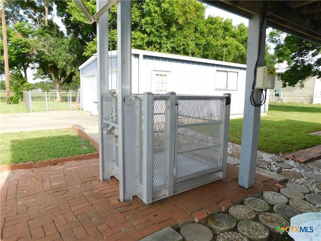 135 W Bayshore Dr, Palacios, TX 77465 - view of patio featuring an outdoor structure