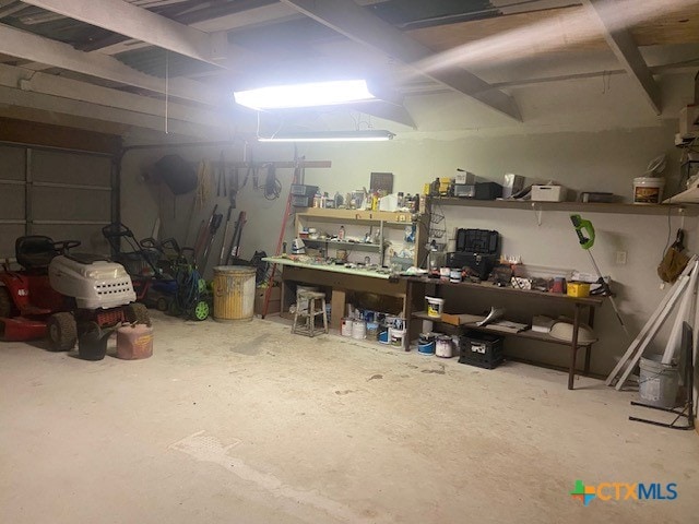 233 Thomas Dr, Martindale, TX 78655 - below grade area with a workshop area