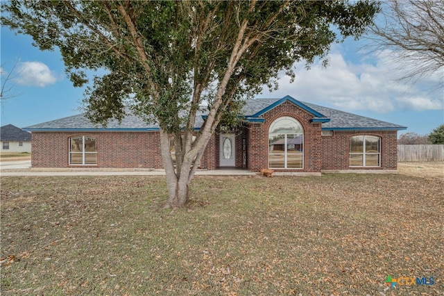 view of front of home with a front yard