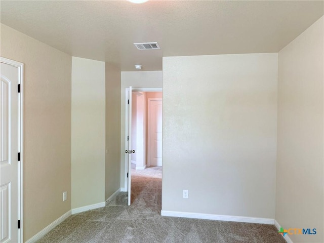 2602 Camp Cooper Dr, Killeen, TX 76549 - spare room featuring light colored carpet and baseboards