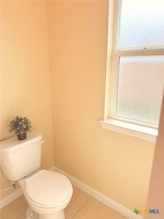 2602 Camp Cooper Dr, Killeen, TX 76549 - bathroom featuring tile patterned flooring, toilet, and baseboards