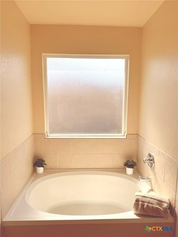 2602 Camp Cooper Dr, Killeen, TX 76549 - full bathroom with plenty of natural light and a bath