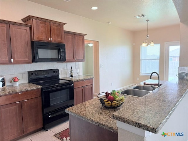 2602 Camp Cooper Dr, Killeen, TX 76549 - kitchen featuring black appliances, a sink, backsplash, hanging light fixtures, and recessed lighting