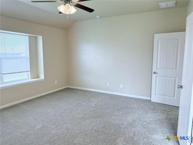 2602 Camp Cooper Dr, Killeen, TX 76549 - empty room featuring carpet flooring, ceiling fan, baseboards, and vaulted ceiling