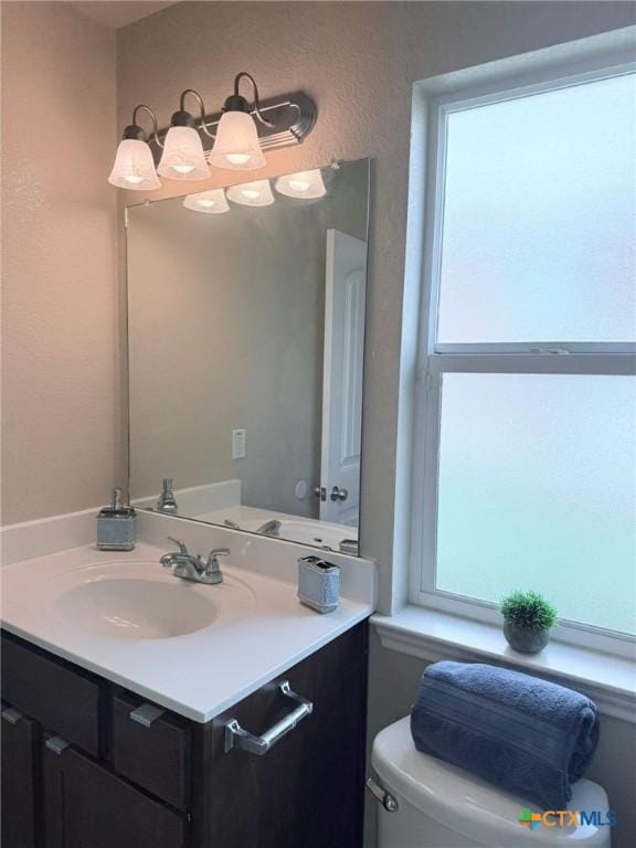 2602 Camp Cooper Dr, Killeen, TX 76549 - half bathroom featuring toilet and vanity