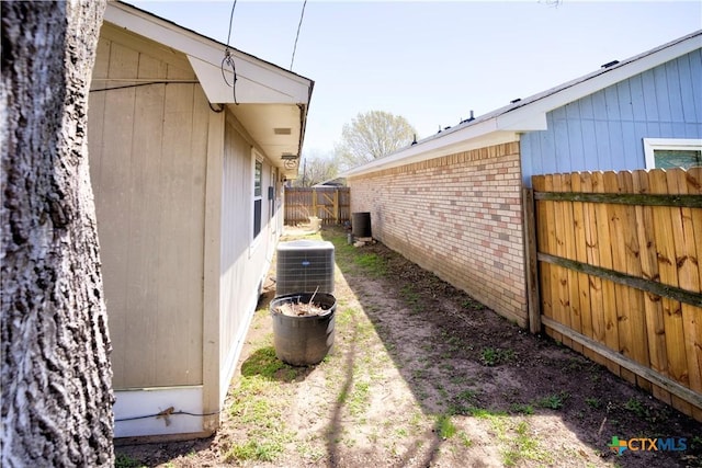 5110 Sam Houston, Temple, TX 76502 - view of side of property with a cooling unit and brick siding