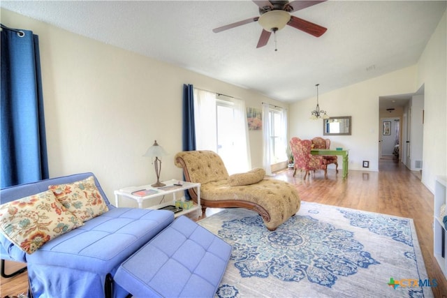 5110 Sam Houston, Temple, TX 76502 - living room featuring lofted ceiling, wood finished floors, and ceiling fan