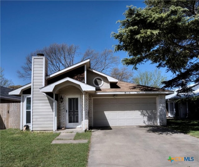 5110 Sam Houston, Temple, TX 76502 - mid-century modern home with driveway, an attached garage, a chimney, and a front yard