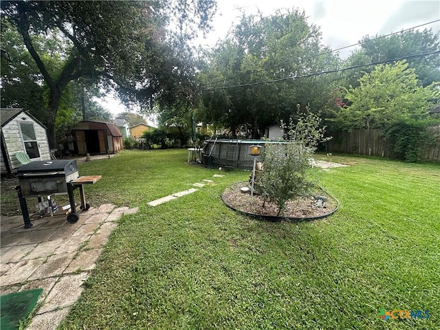 502 Tommy Dr, Port Lavaca, TX 77979 - view of yard with a storage shed
