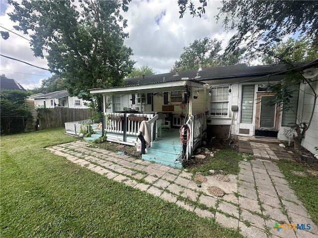502 Tommy Dr, Port Lavaca, TX 77979 - rear view of house featuring a deck