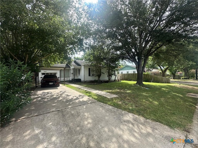 502 Tommy Dr, Port Lavaca, TX 77979 - view of front of house featuring a garage and driveway