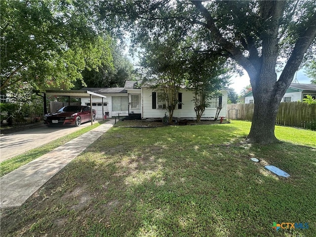 502 Tommy Dr, Port Lavaca, TX 77979 - view of front of property featuring driveway and an attached carport