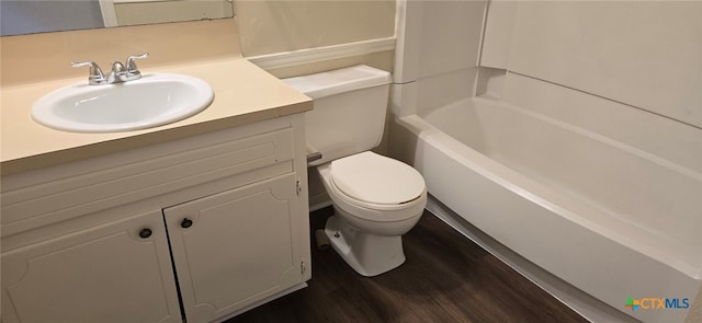 full bath with toilet, vanity, and wood finished floors