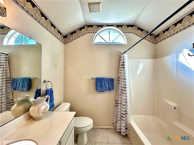 full bath with tile patterned flooring, visible vents, vaulted ceiling, and toilet