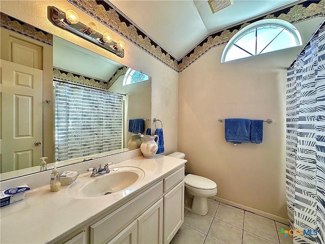full bath with vanity, visible vents, vaulted ceiling, toilet, and tile patterned floors