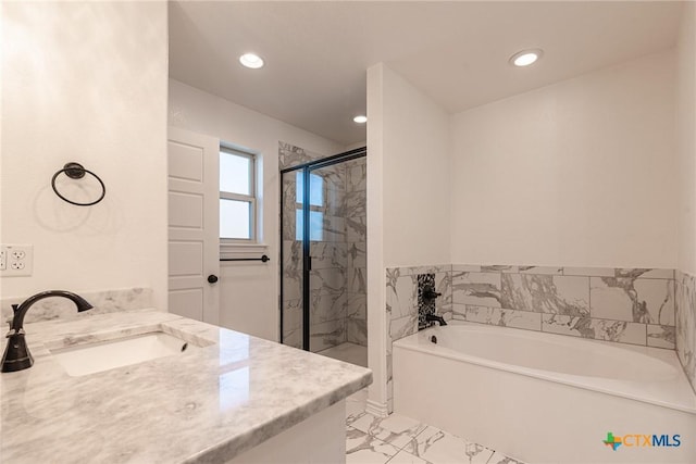6106 Cactus Flower Ln, Killeen, TX 76549 - bathroom featuring vanity, a garden tub, marble look tile flooring, a stall shower, and recessed lighting