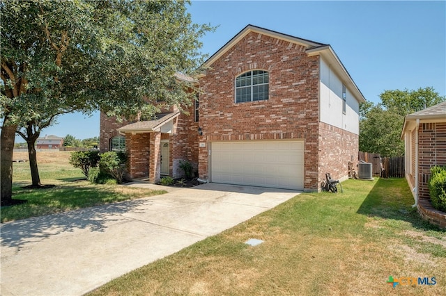 front of property with a garage, a front lawn, and cooling unit