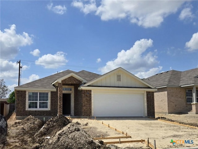 1402 Lindsey Dr, Copperas Cove, TX 76522 - ranch-style house featuring board and batten siding, brick siding, fence, dirt driveway, and an attached garage