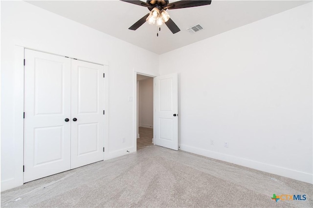2002 Rosson St, Nolanville, TX 76559 - unfurnished bedroom featuring carpet flooring, a closet, and a ceiling fan