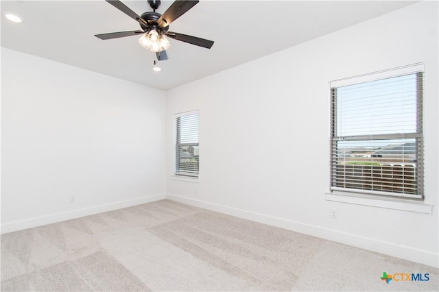 2002 Rosson St, Nolanville, TX 76559 - spare room featuring light carpet, recessed lighting, and a ceiling fan