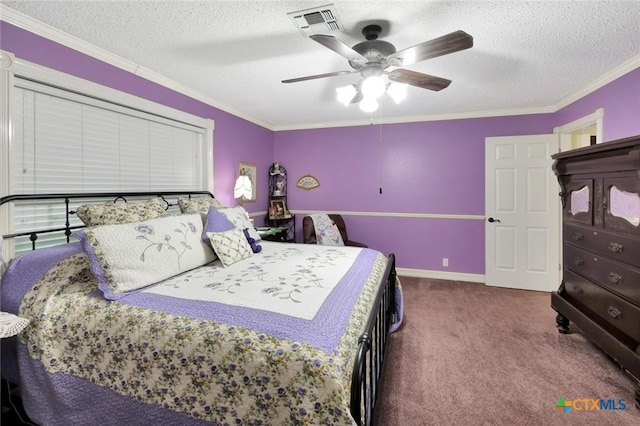 bedroom with a textured ceiling, carpet floors, ceiling fan, and crown molding