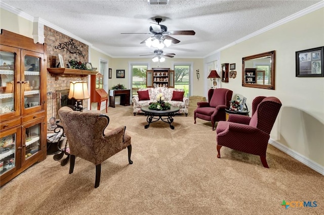 carpeted living room featuring crown molding, ceiling fan, a textured ceiling, and a brick fireplace