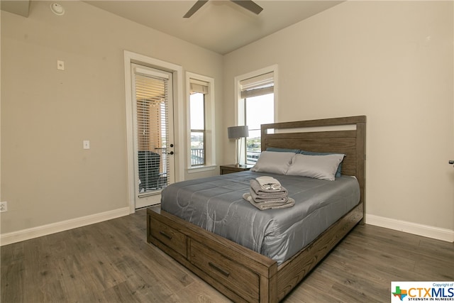 bedroom featuring ceiling fan, access to exterior, and dark hardwood / wood-style flooring