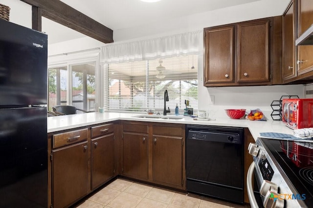 5006 Las Campanas St, San Antonio, TX 78233 - kitchen featuring black appliances, a sink, light countertops, beamed ceiling, and light tile patterned floors