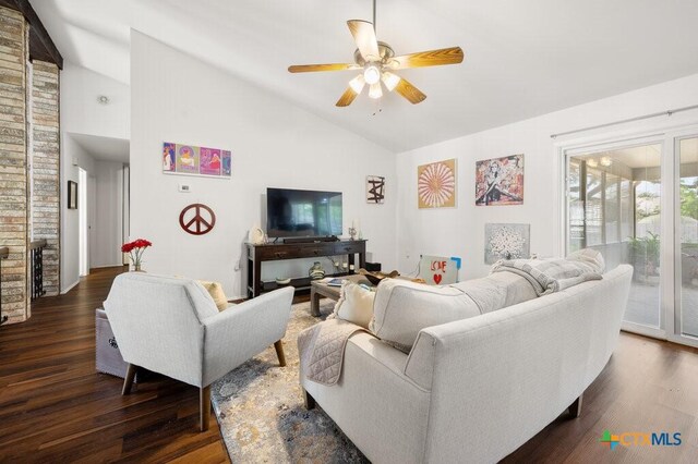 5006 Las Campanas St, San Antonio, TX 78233 - living area with vaulted ceiling, a ceiling fan, and dark wood-style floors