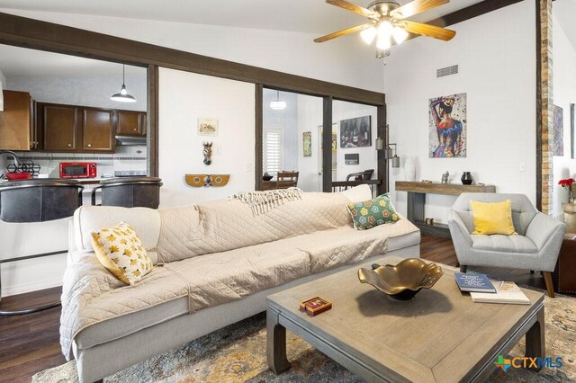 5006 Las Campanas St, San Antonio, TX 78233 - living area with lofted ceiling, a ceiling fan, and wood finished floors
