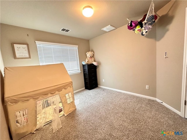 125 Duck Creek Trl, San Marcos, TX 78666 - unfurnished bedroom featuring carpet floors and baseboards