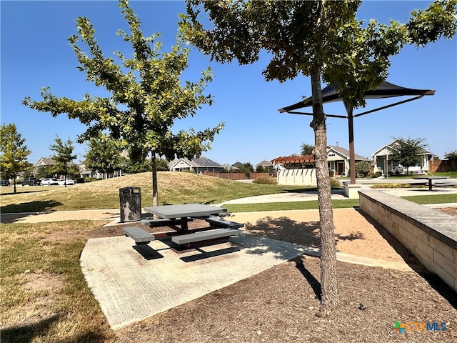 view of community featuring a yard