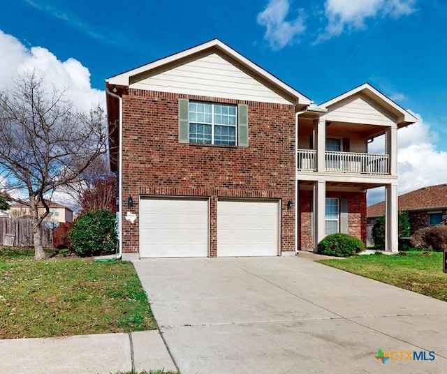 view of front facade featuring a garage, a balcony, and a front lawn