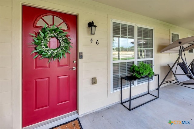 46 Bluestem St, Victoria, TX 77904 - doorway to property with covered porch