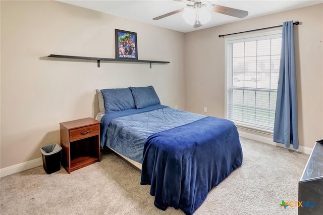 46 Bluestem St, Victoria, TX 77904 - bedroom featuring carpet, baseboards, and ceiling fan
