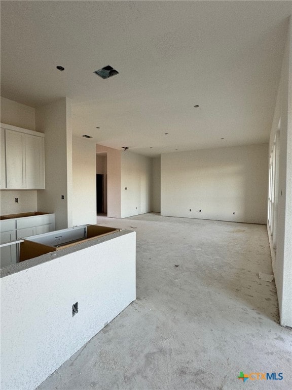 kitchen featuring white cabinets