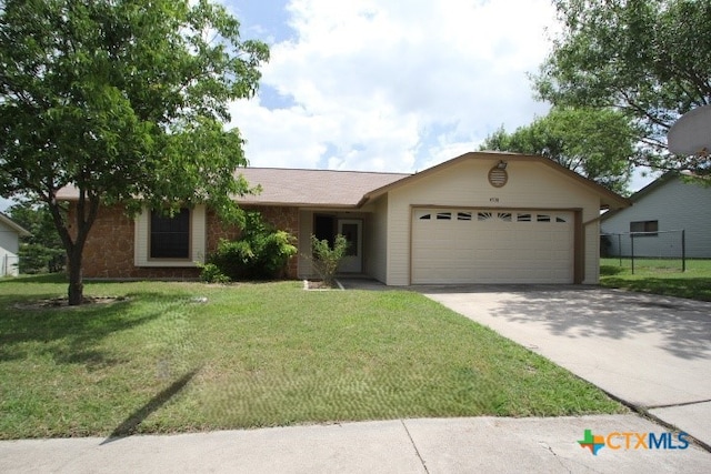 4508 Greenbriar Cir, Killeen, TX 76543 - ranch-style home featuring a garage and driveway