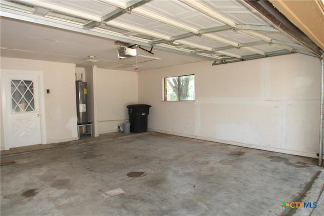 4508 Greenbriar Cir, Killeen, TX 76543 - garage featuring electric water heater and a garage door opener