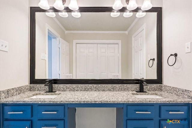 bathroom with double vanity, a sink, and crown molding