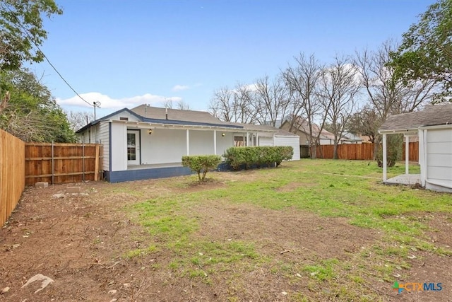 view of yard featuring a fenced backyard