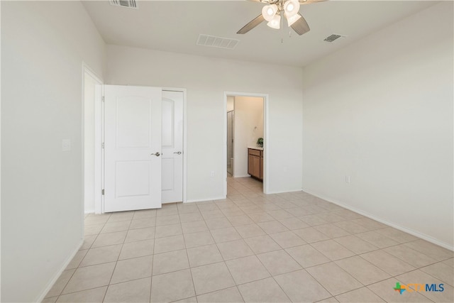 unfurnished bedroom featuring ceiling fan