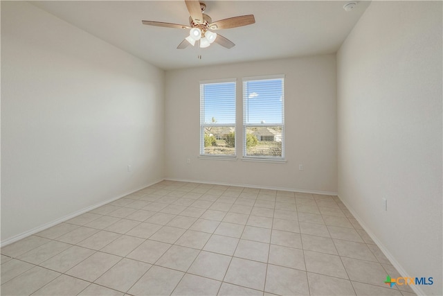 spare room with ceiling fan