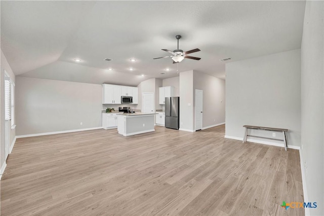 604 Cypress Arbor, Seguin, TX 78155 - unfurnished living room with a ceiling fan, vaulted ceiling, light wood-style flooring, baseboards, and recessed lighting