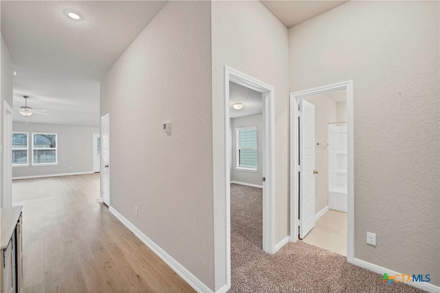 604 Cypress Arbor, Seguin, TX 78155 - hallway with baseboards and light wood-style floors